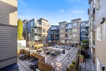 Outdoor patio area at 128 on state apartments in kirkland, wa 98033